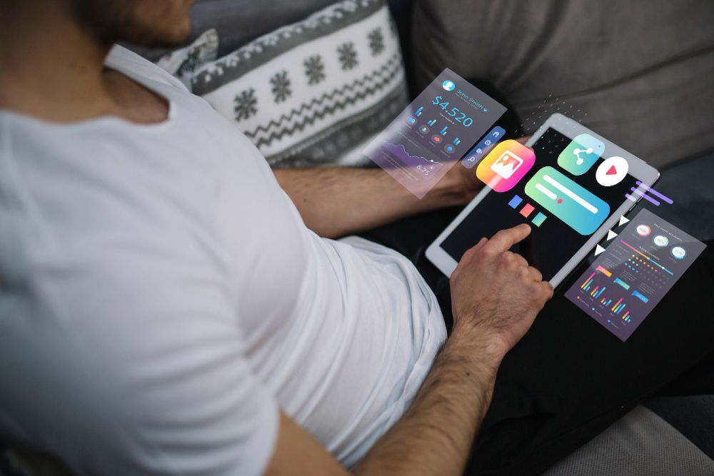 Artist mobile app features including fan community, push notifications, photo gallery, video section and direct audience engagement